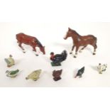 Toys: A quantity of cast animals in the Britain's style. to include horses, chickens, turkey, birds,