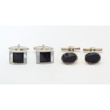 Two pairs of cufflinks to include a silver example. (2+2) Please Note - we do not make reference