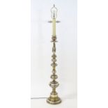 A mid 20thC continental silver plated standard lamp, the column with circular base and six