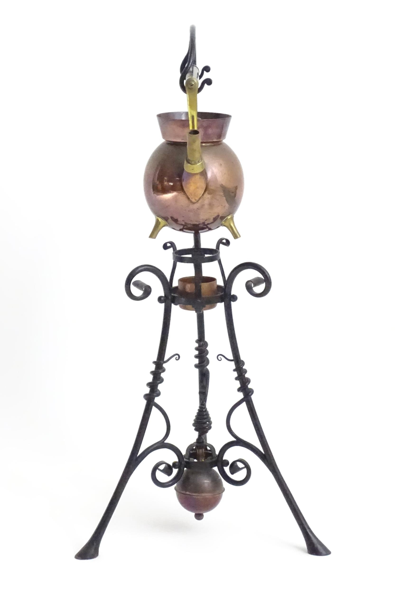 An Arts & Crafts copper and brass spirit kettle on a scrolling wrought iron stand designed by Dr - Image 10 of 20