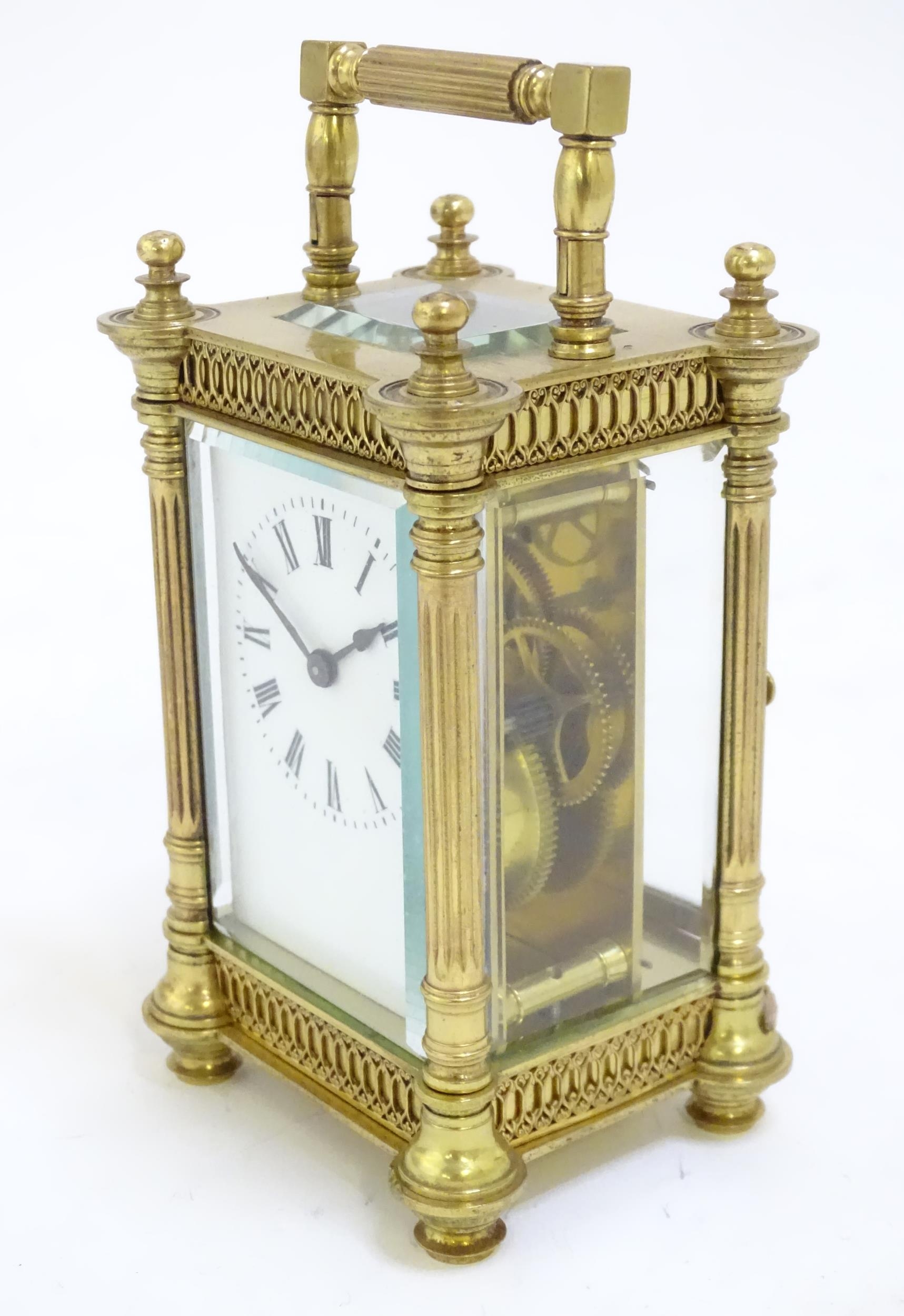 A brass carriage clock with white enamel dial. the whole 6 1/2" high overall. Please Note - we do - Image 4 of 11