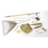 A collection of mid to late 20thC fishing equipment, comprising a 53" boat gaff, a landing net and a