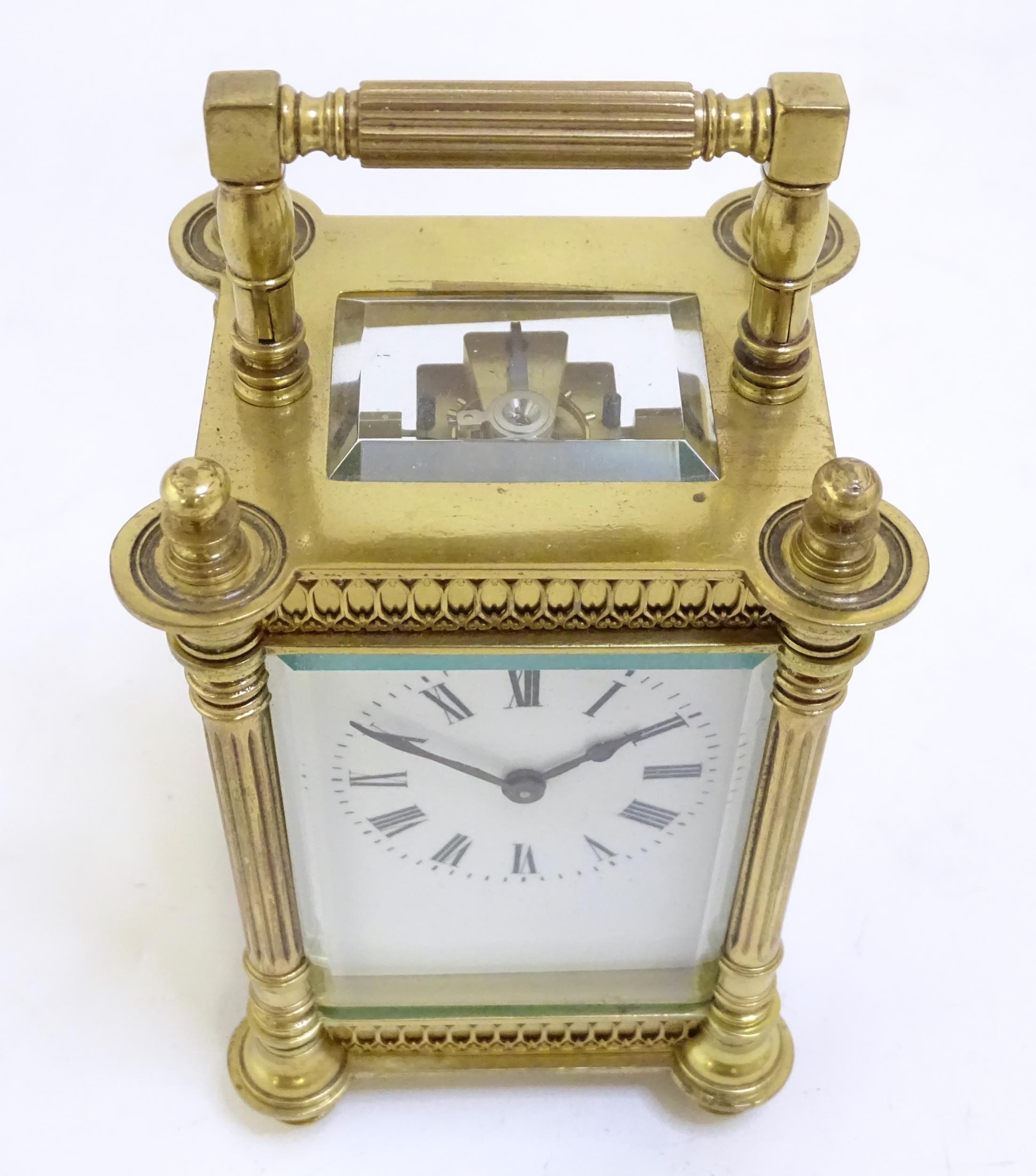 A brass carriage clock with white enamel dial. the whole 6 1/2" high overall. Please Note - we do - Image 5 of 11