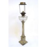 A 19thC oil table lamp, the silver plated base formed as a corinthian column supporting a cut