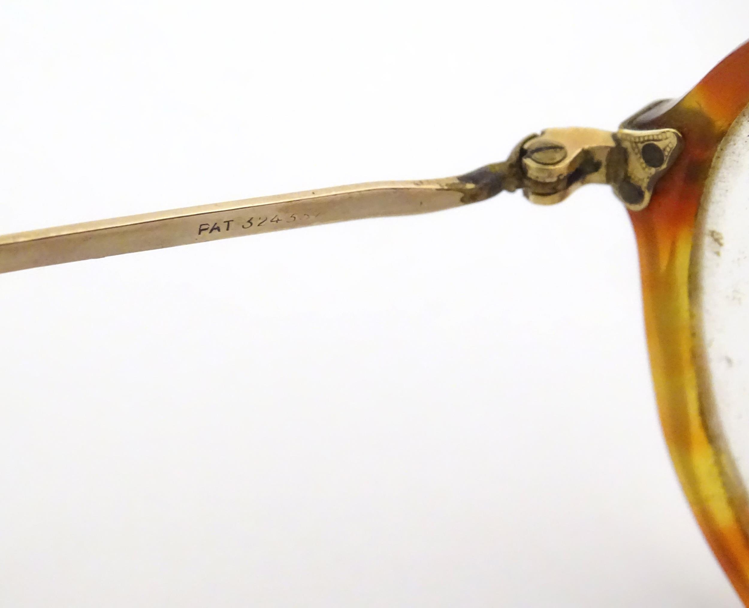 A cased pair of c1940s bifocal spectacles / glasses, with faux tortoiseshell and gilt metal - Image 2 of 11