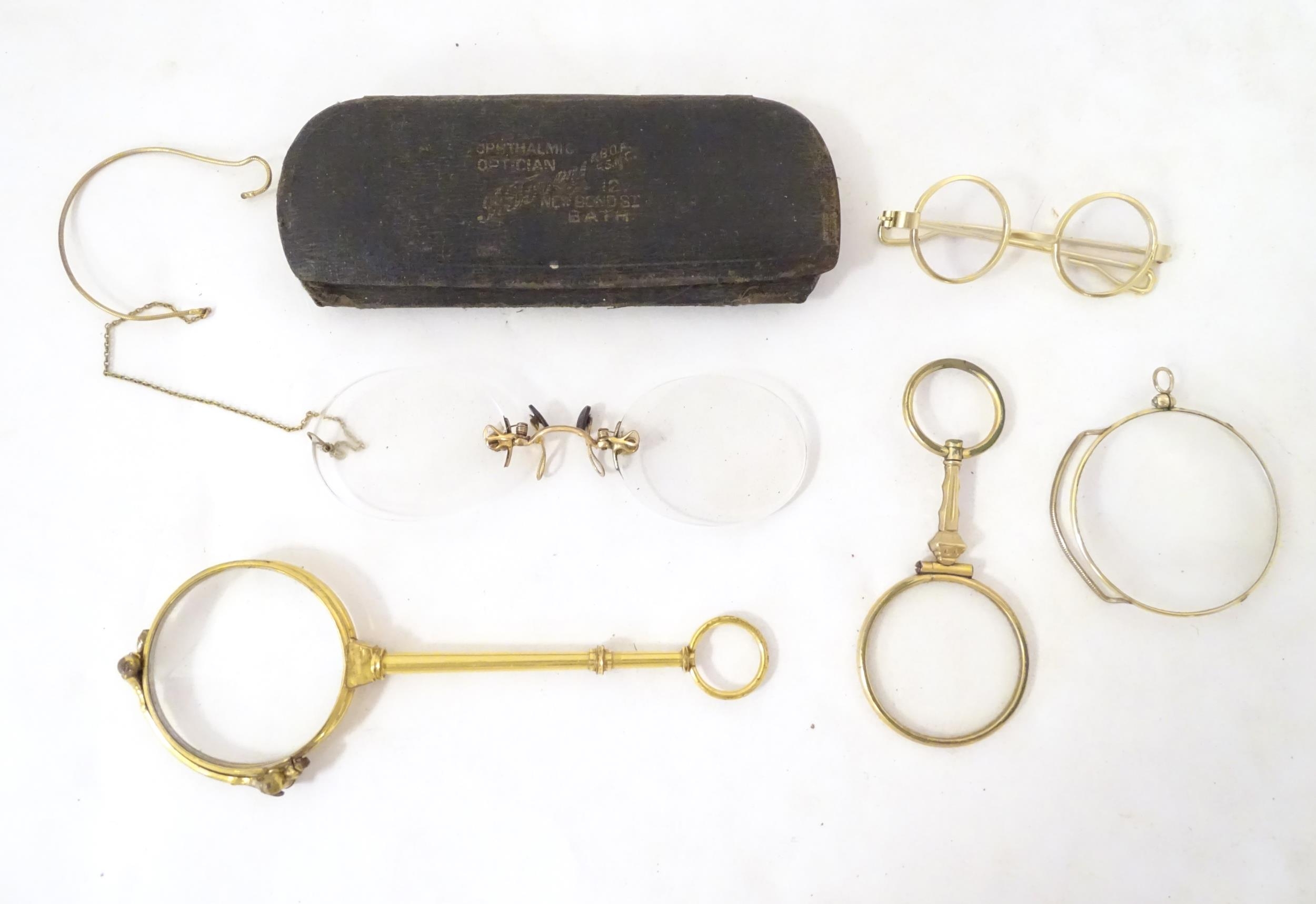 A quantity of late 19thC and later yellow metal pince nez, spectacles and monocles, the largest - Image 3 of 9