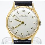 A gentleman's Doxa Anti Magnetique wrist watch with 14ct gold case. Dial approx. 1 1/4" diameter