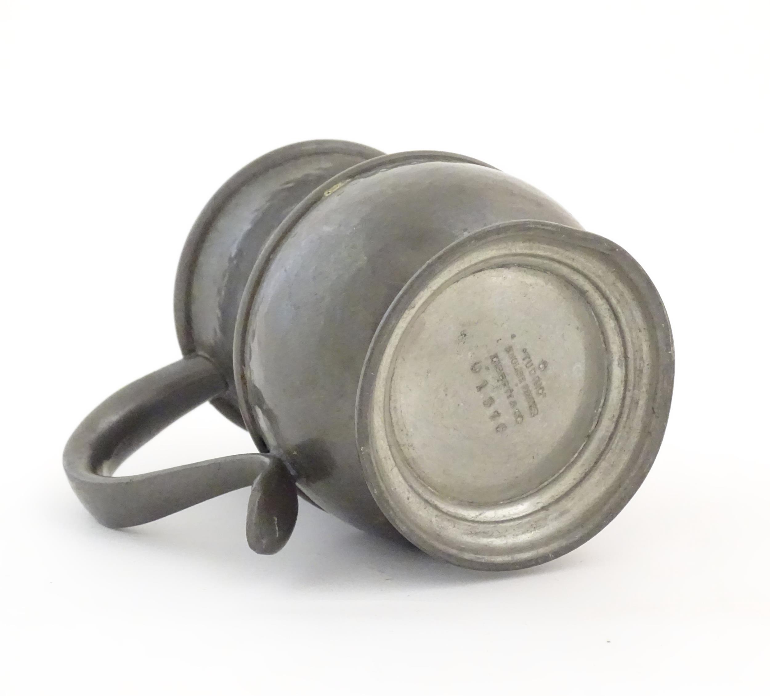 An Arts & Crafts Liberty & Co. Tudric pewter tankard with hammered decoration, in the manner of - Image 8 of 8