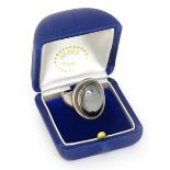 A Georg Jensen Sterling silver ring set with hematite style cabochon. Marked Georg Jensen Denmark