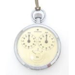 A Junghans time meter stop watch. 2 1/4" wide Please Note - we do not make reference to the