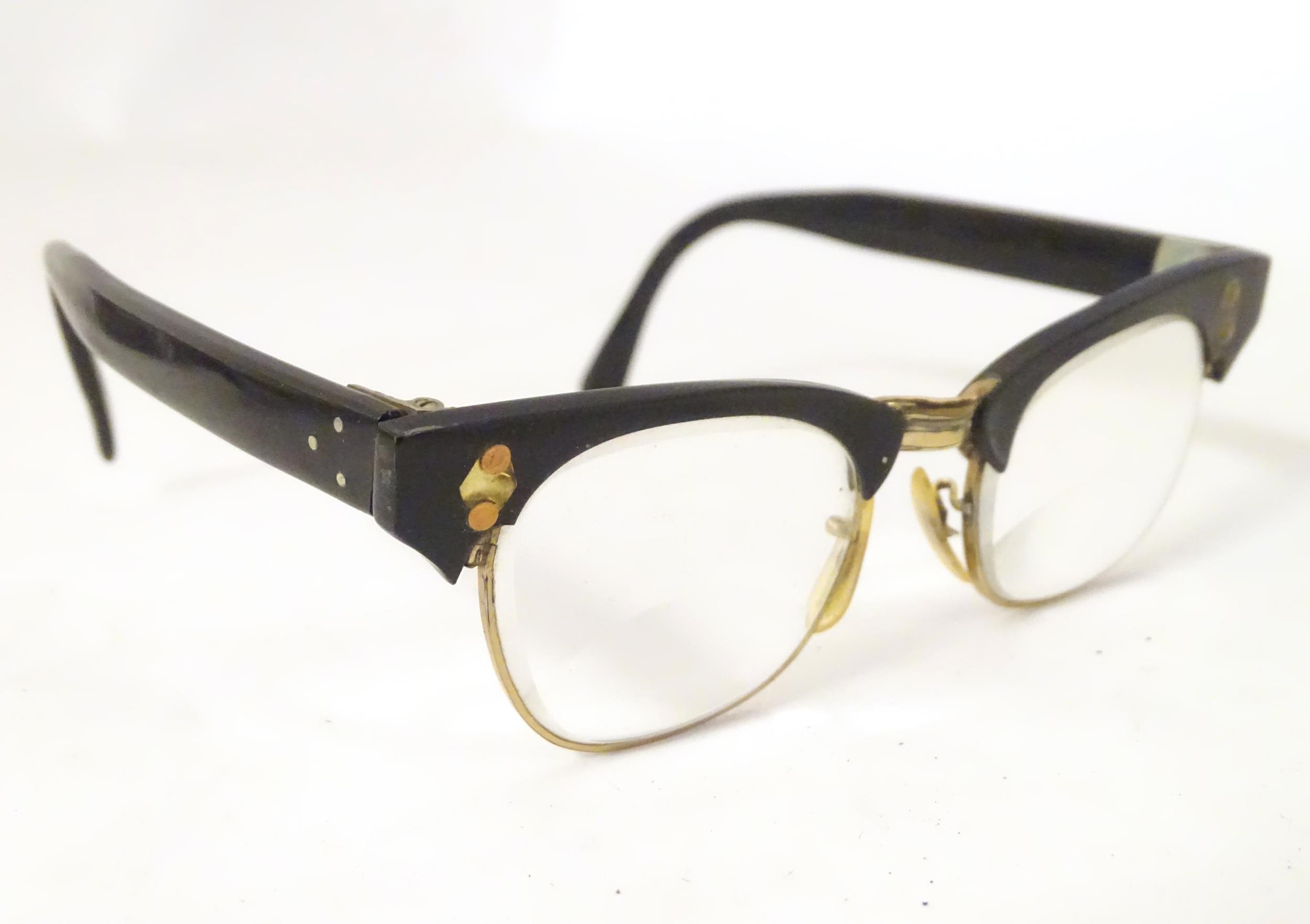 Four pairs of mid 20thC spectacles / glasses, the largest 5 1/4" wide (4) Please Note - we do not - Image 5 of 6