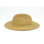 Toy : a doll's straw hat, bearing interior label: straw hat replica for the Sister Princesses,