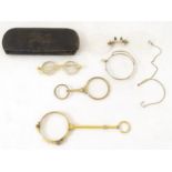 A quantity of late 19thC and later yellow metal pince nez, spectacles and monocles, the largest