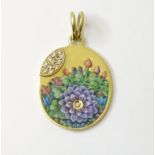 A Continental 18ct gold pendant with set with diamonds and enamel flower detail. Approx. 1 1/4" long