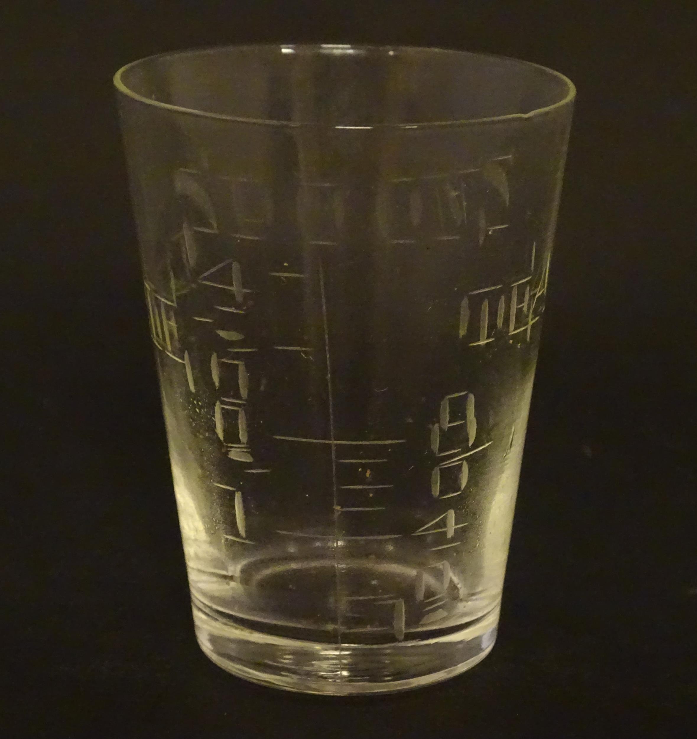 A 19thC medicine measuring glass, in a fitted cylindrical leather case Please Note - we do not - Image 2 of 8