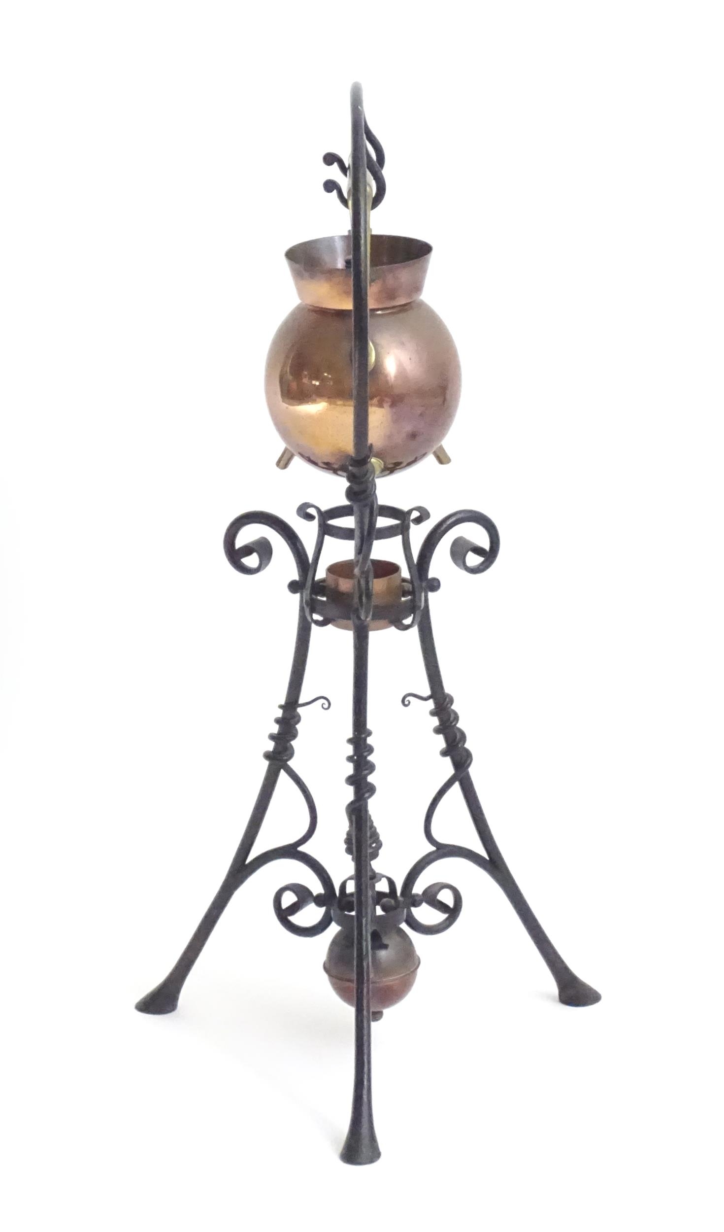 An Arts & Crafts copper and brass spirit kettle on a scrolling wrought iron stand designed by Dr - Image 6 of 20