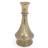 An 18th / 19thC Indian brass vase with engraved banded detail. Approx. 8 1/4" high Please Note -