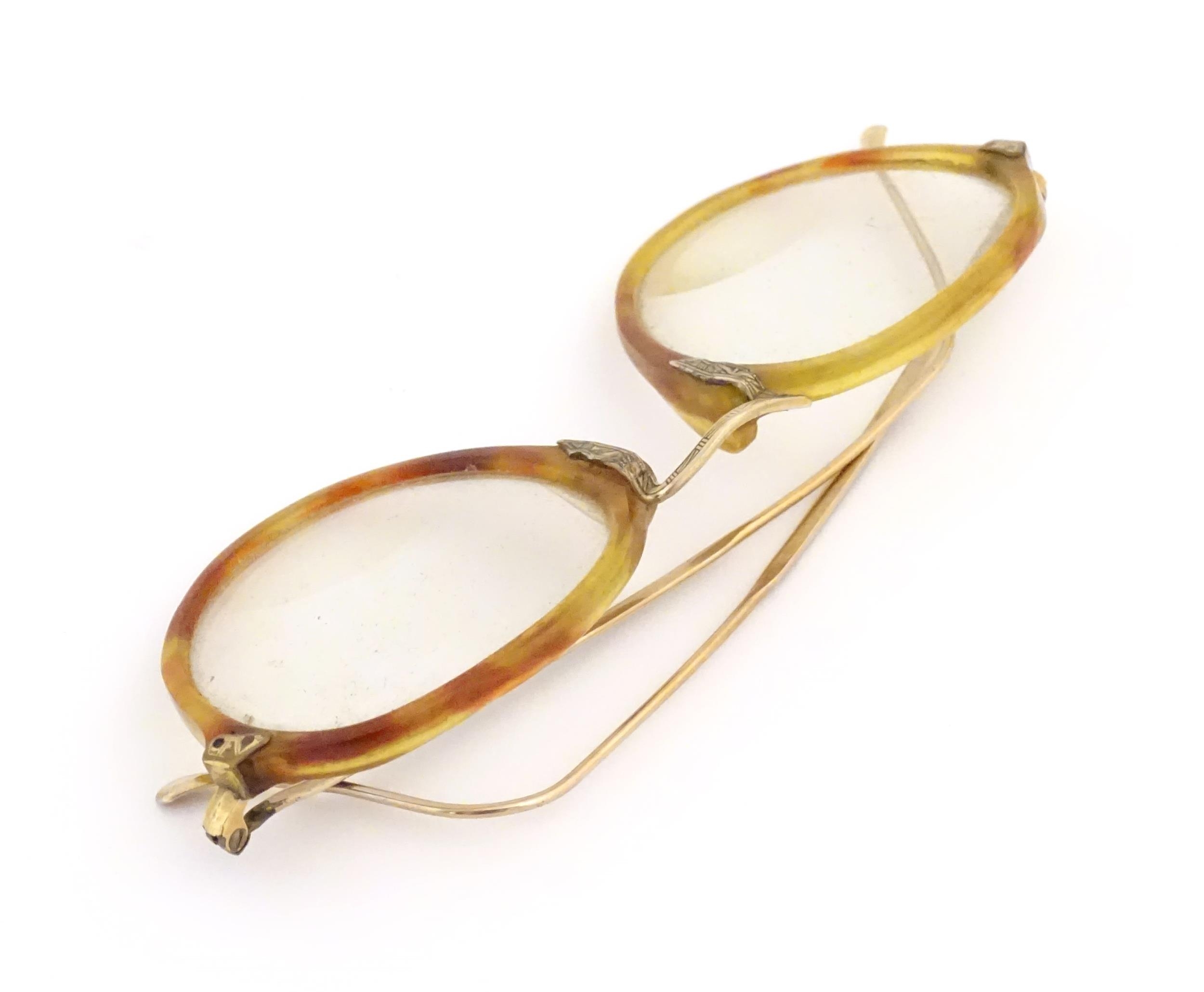 A cased pair of c1940s bifocal spectacles / glasses, with faux tortoiseshell and gilt metal - Image 8 of 11