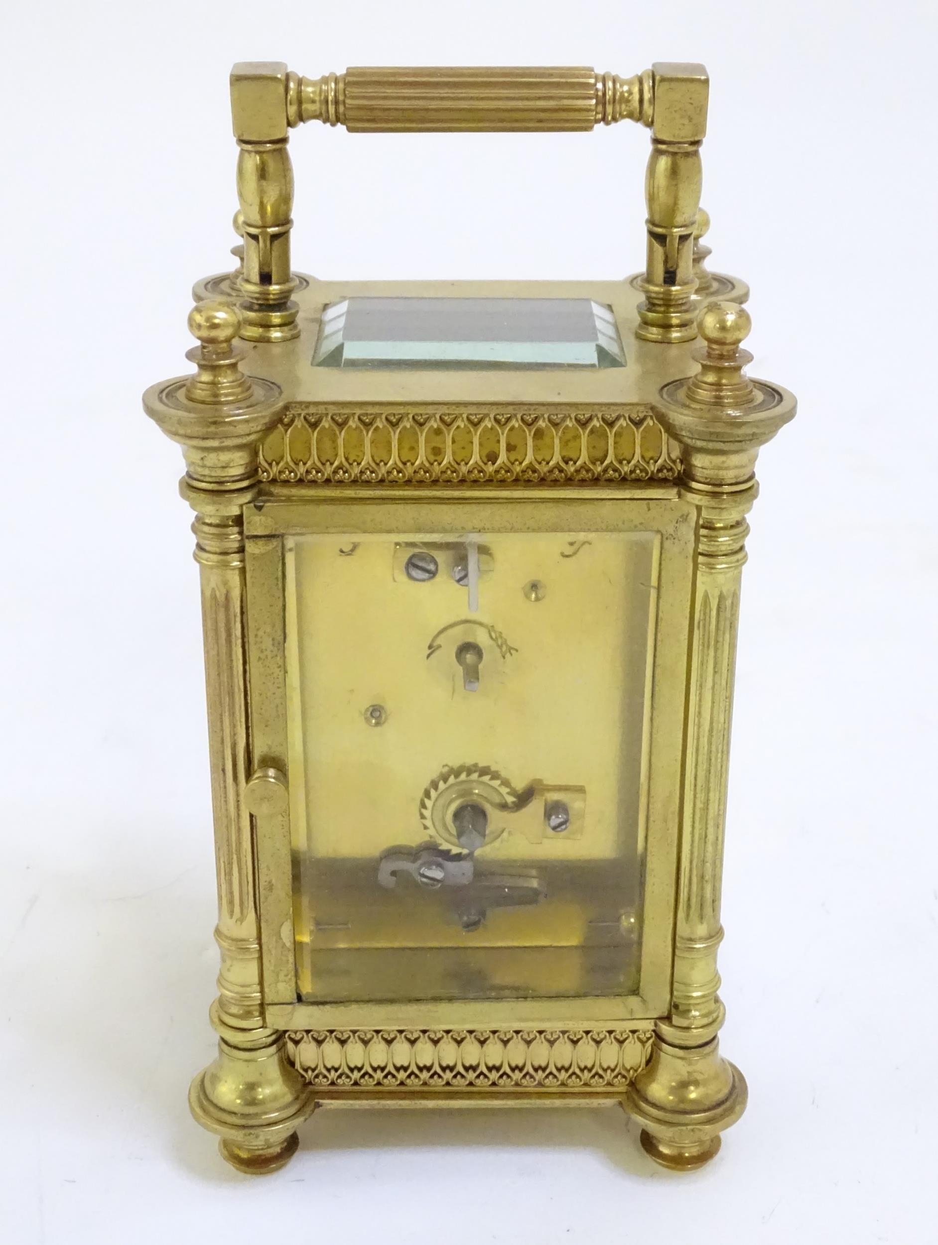 A brass carriage clock with white enamel dial. the whole 6 1/2" high overall. Please Note - we do - Image 10 of 11