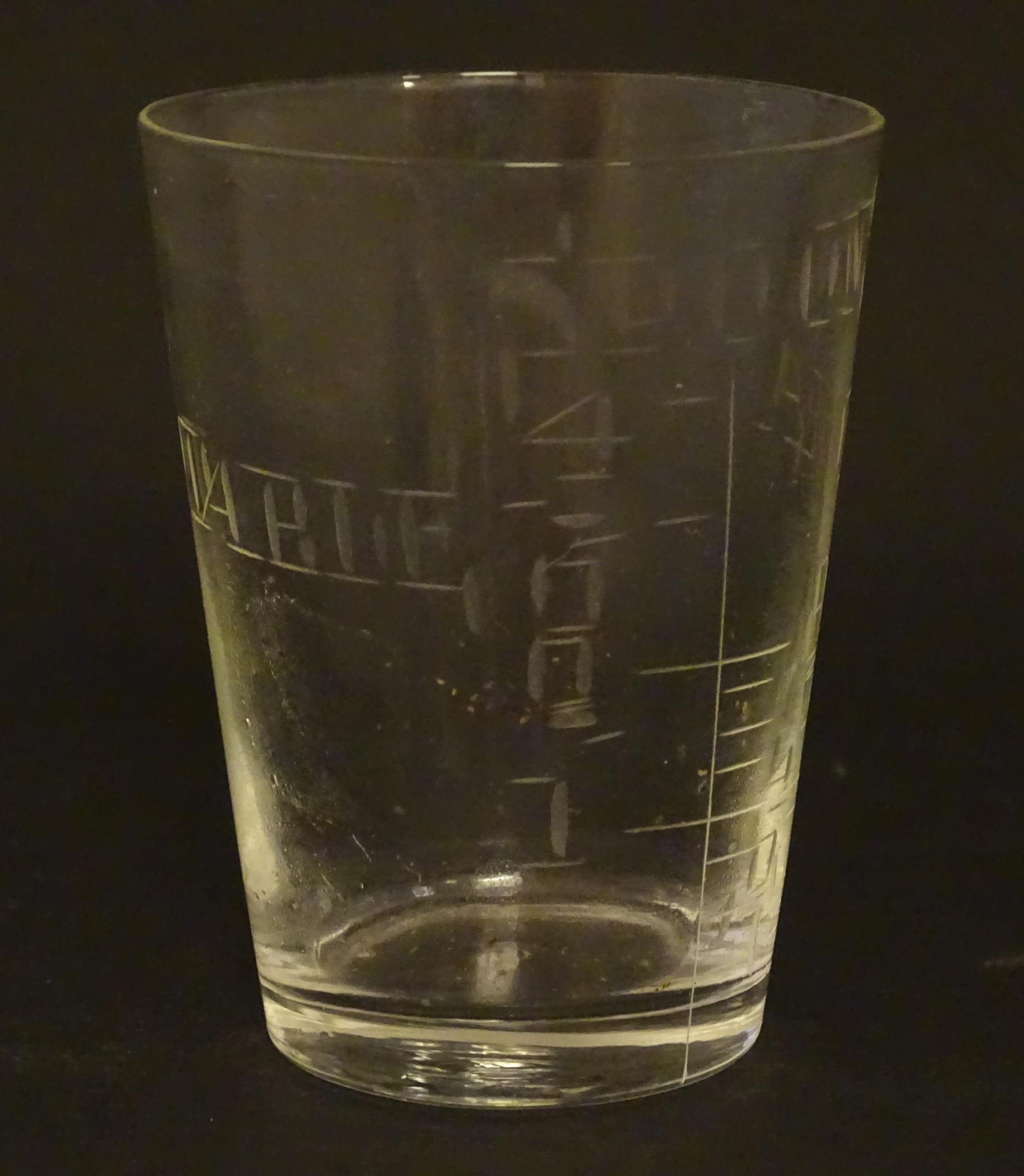 A 19thC medicine measuring glass, in a fitted cylindrical leather case Please Note - we do not - Image 8 of 8