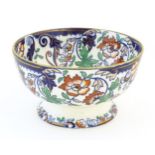 An ironstone bowl decorated in the Amherst Japan pattern with gilt highlights. Marked under. Approx.