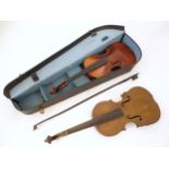 Musical Instruments: the major parts of two mid 20thC violins, each approx. 23 1/8" long, together