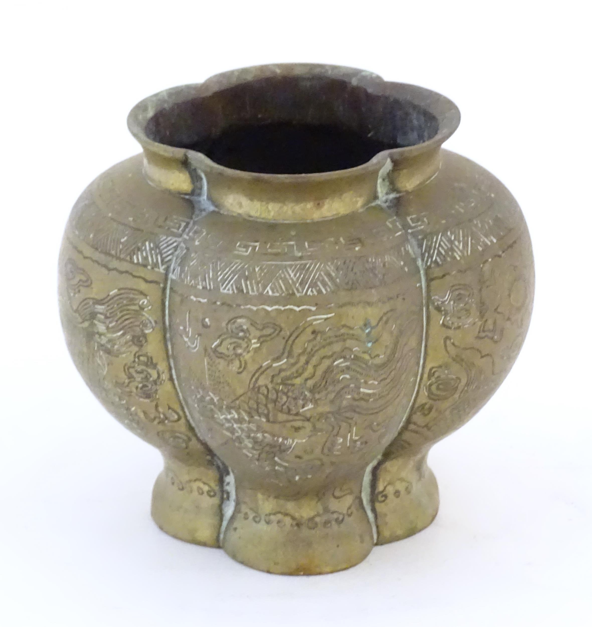 A Chinese brass lobed pot decorated with dragons, phoenix birds and pagoda buildings. Character - Image 5 of 7