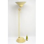 A mid-20thC Art Deco style standard lamp, with conical uplighter supported by two columns on a