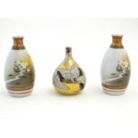 Three Japanese vases, comprising a pair decorated with a landscape scene with quail birds and