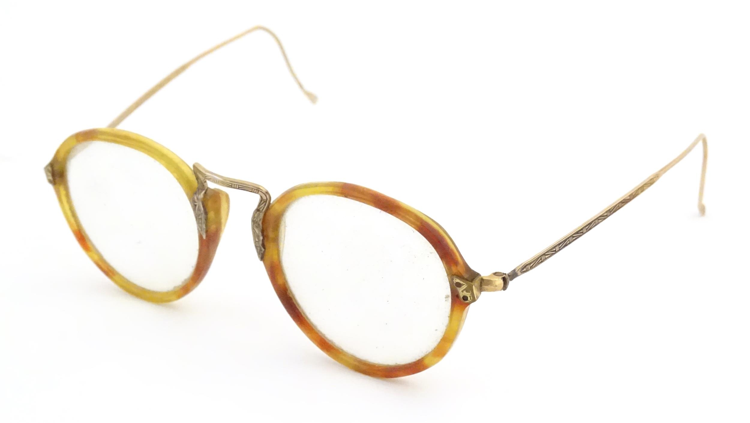 A cased pair of c1940s bifocal spectacles / glasses, with faux tortoiseshell and gilt metal - Image 5 of 11