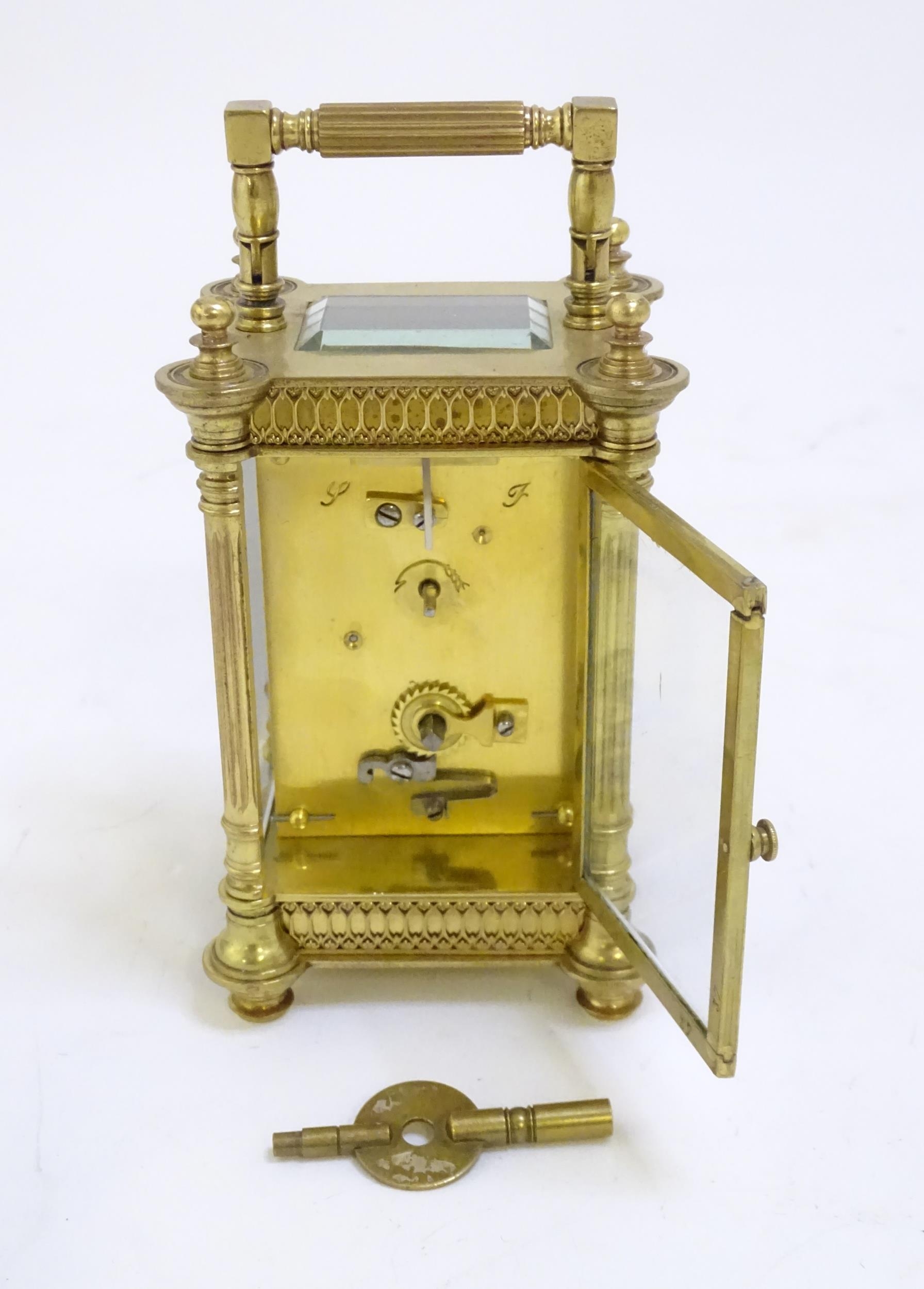 A brass carriage clock with white enamel dial. the whole 6 1/2" high overall. Please Note - we do - Image 11 of 11