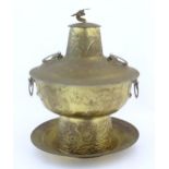 A Chinese cast metal twin handled warming / steaming pot comprising, stand, burner section, bowl,