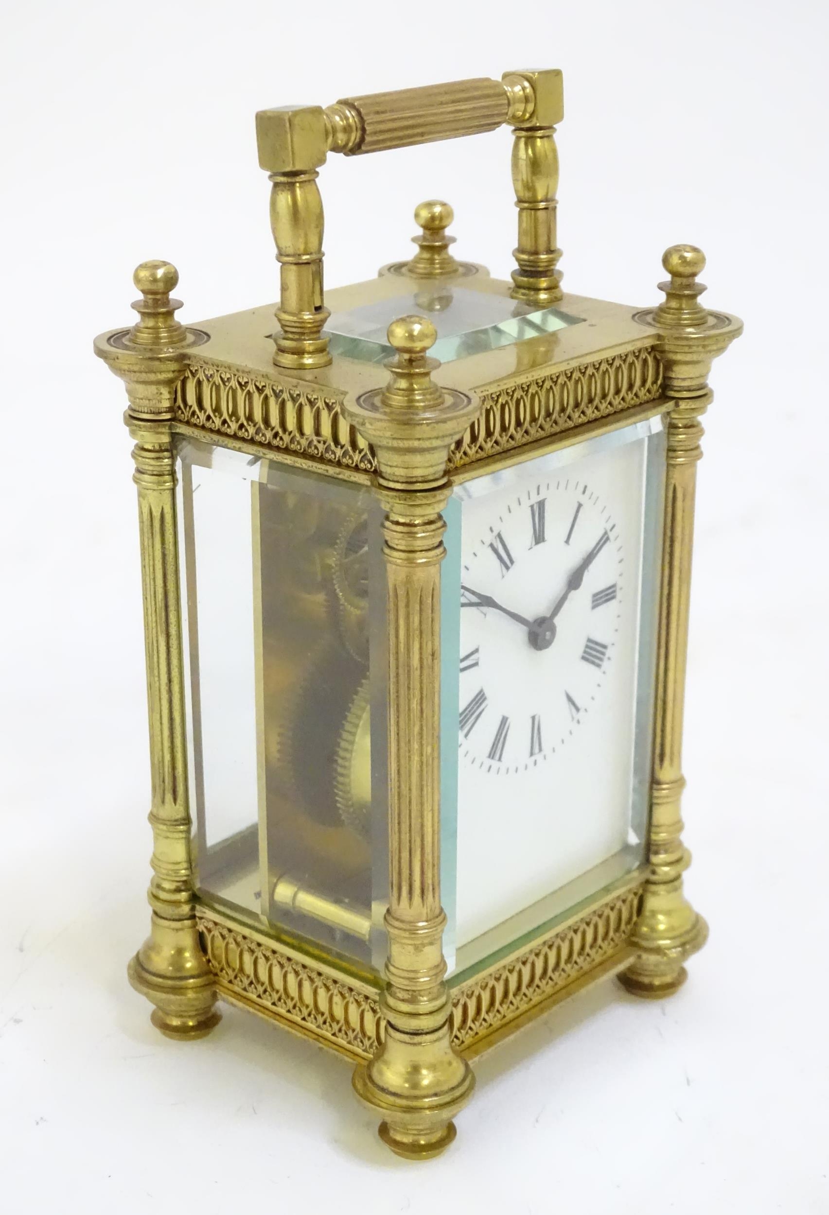 A brass carriage clock with white enamel dial. the whole 6 1/2" high overall. Please Note - we do - Image 3 of 11