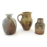 Three studio pottery items to include a vase by Liz Teall, impressed 212 2003 under with label; a