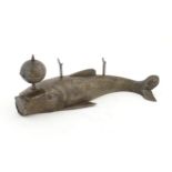 An Oriental cast metal novelty standish modelled as a fish with gilt scale detail, with pen rest and