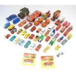 Toys: a quantity of assorted 20thC scale model cars / vehicles, the larger examples comprising a