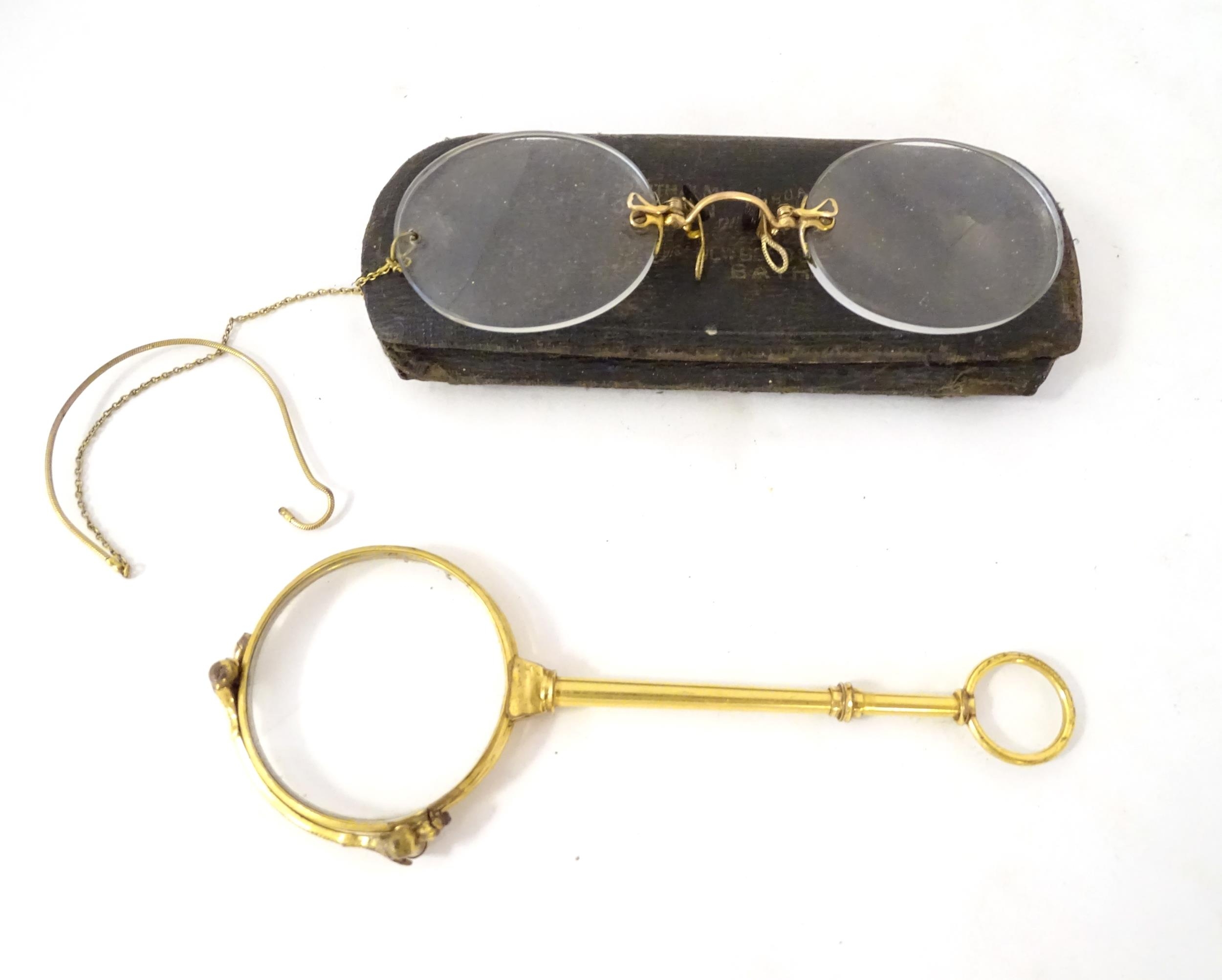 A quantity of late 19thC and later yellow metal pince nez, spectacles and monocles, the largest - Image 5 of 9