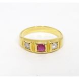 A Victorian 18ct gold ring set with ruby and diamonds. Ring size approx. N Please Note - we do not