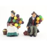 Two Royal Doulton figures modelled as balloon sellers, HN1315 and HN1954. Marked under. Approx. 7