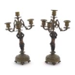 Two 19thC cast metal table candelabra / candelabrum the central bronze columns form as cherubs