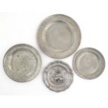 Four assorted pewter plates, comprising a 20thC Les Etains du Manoir plate decorated with heraldic