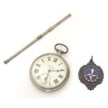 A Festival of Britain 1951 fob with enamel decoration. Together with a pocket watch, the dial signed