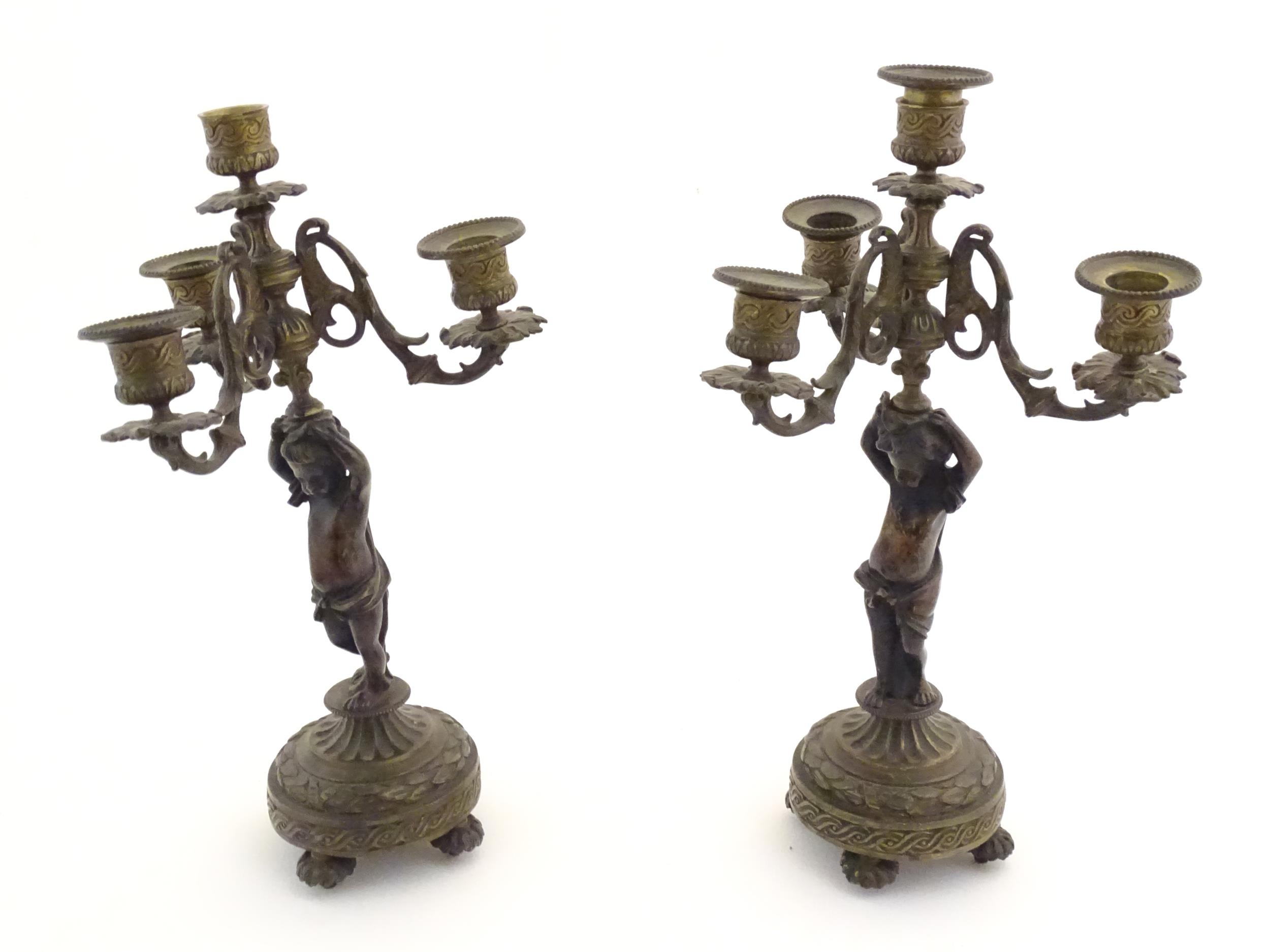 Two 19thC cast metal table candelabra / candelabrum the central bronze columns form as cherubs - Image 9 of 12