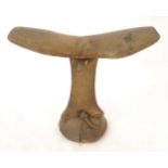 Ethnographic / Native / Tribal: An African carved hardwood headrest / neck rest with leather