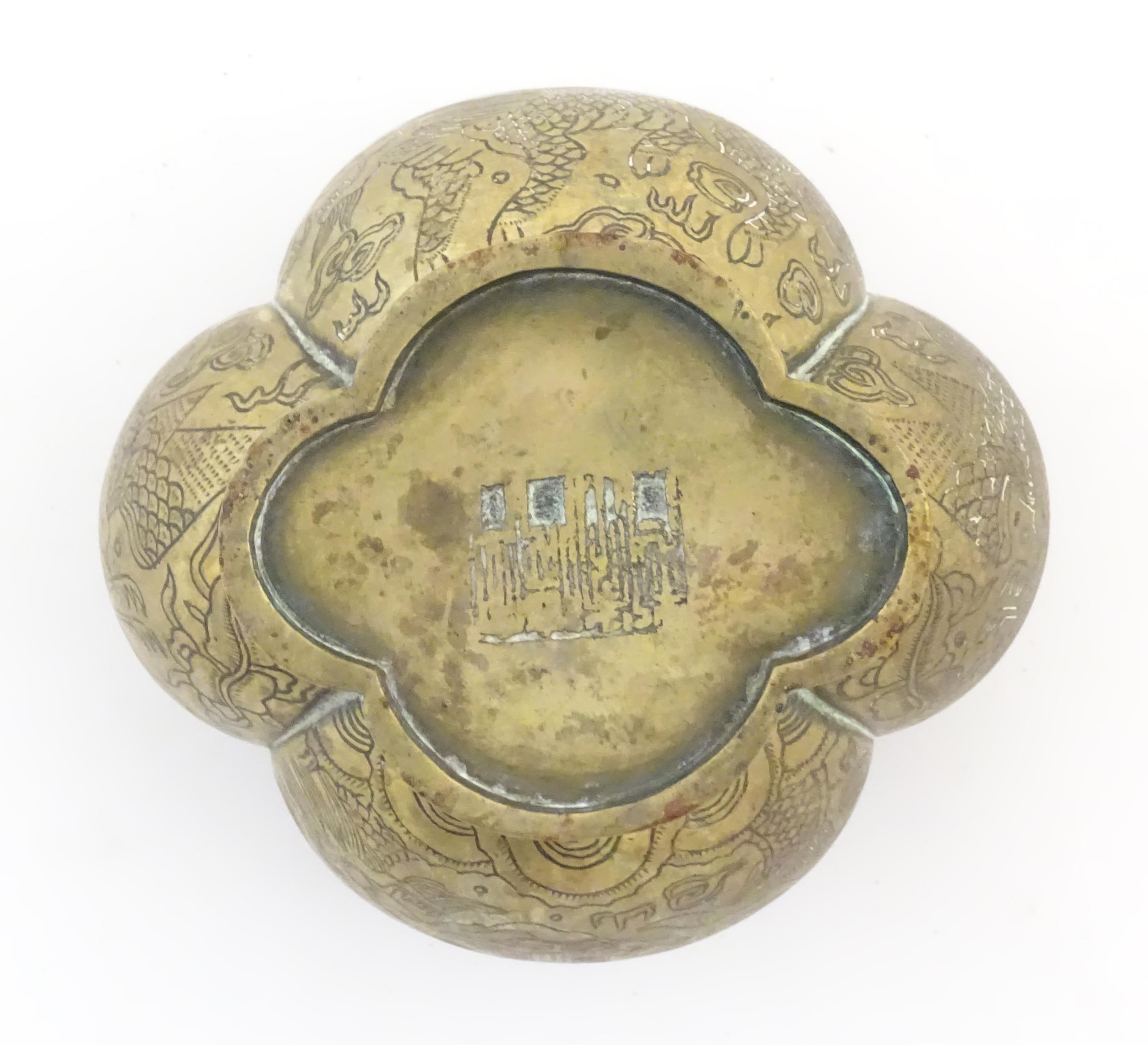 A Chinese brass lobed pot decorated with dragons, phoenix birds and pagoda buildings. Character - Image 7 of 7