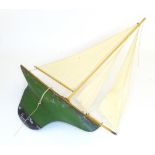 Toy : an early to mid 20thC pond yacht / model sailing boat, named Skylark, with moulded hull in