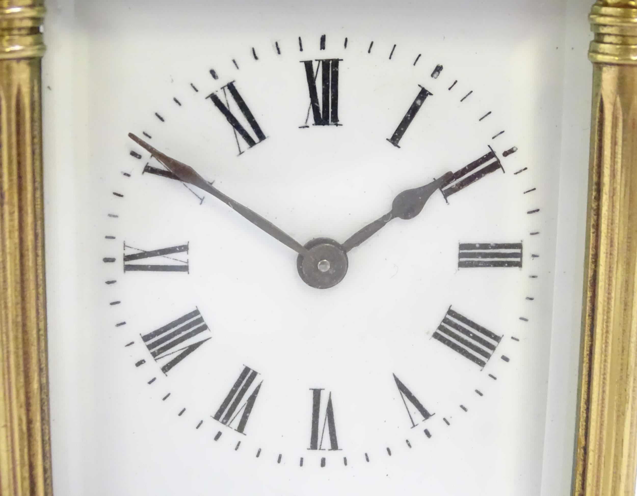 A brass carriage clock with white enamel dial. the whole 6 1/2" high overall. Please Note - we do - Image 6 of 11