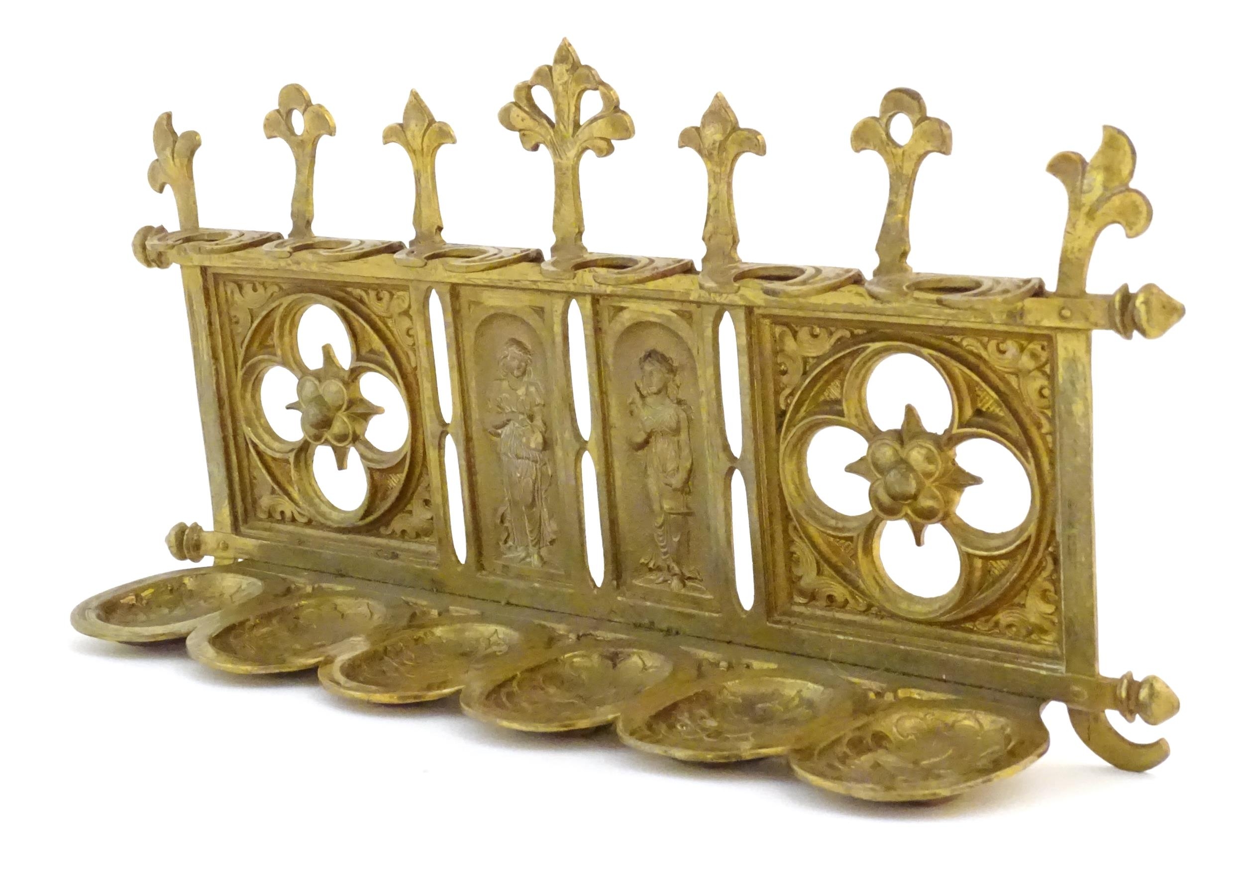 An early 20thC cast brass pipe rack with provision for 6 pipes with Gothic style decoration, pierced - Image 5 of 7