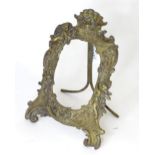 An early 20thC French easel back photograph frame with cast brass surround. Approx. 8 1/2" high