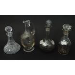 4 Glass decanters and wine / decanter labels. Largest approx 11" high Please Note - we do not make